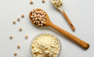 Chickpeas on a spoon, plant-based proteins