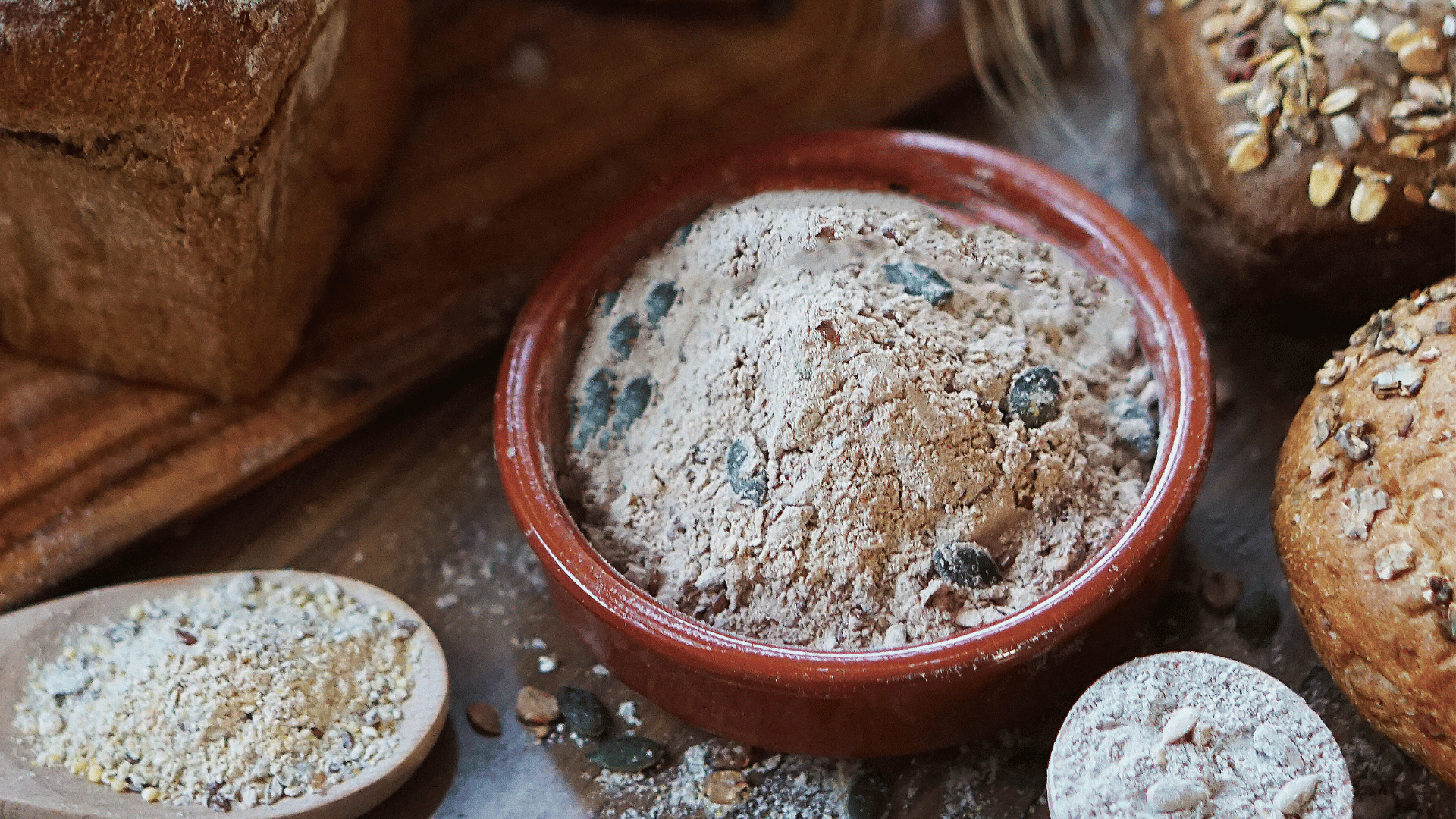 Multigrain breads and cereal flours showcasing malted and wholegrain bakery ingredient applications