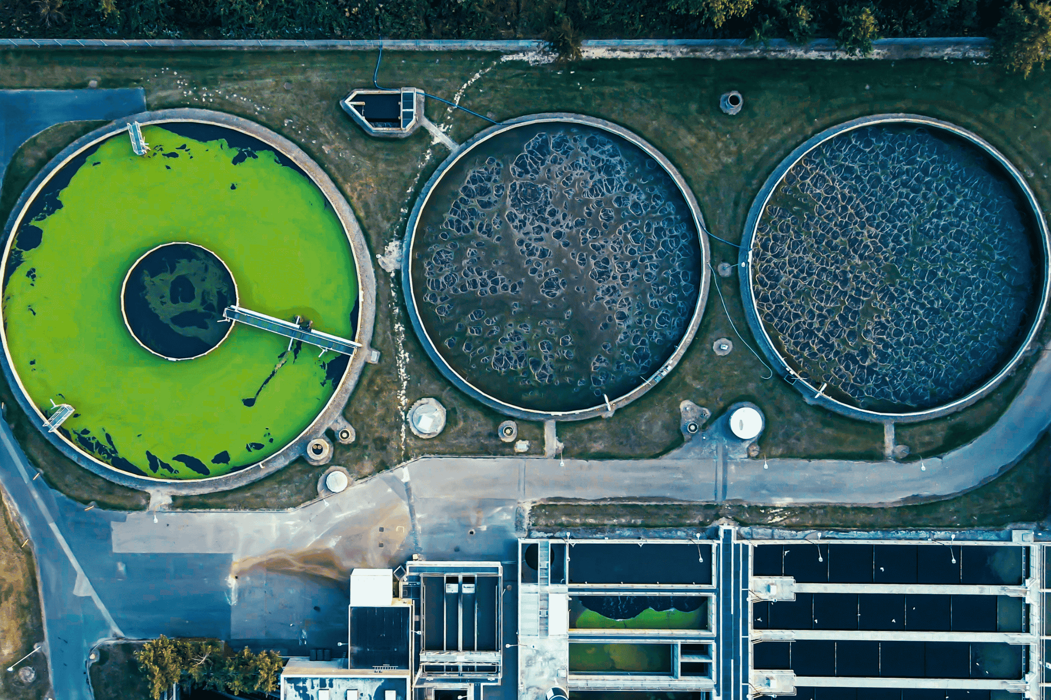 Industrial water treatment process with equipment supporting clarification and solids separation